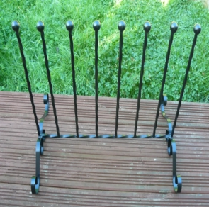 Wrought iro scrolled boot rack